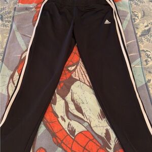 adidas Black Womens Joggers with White Side Stripes and zippers on legs